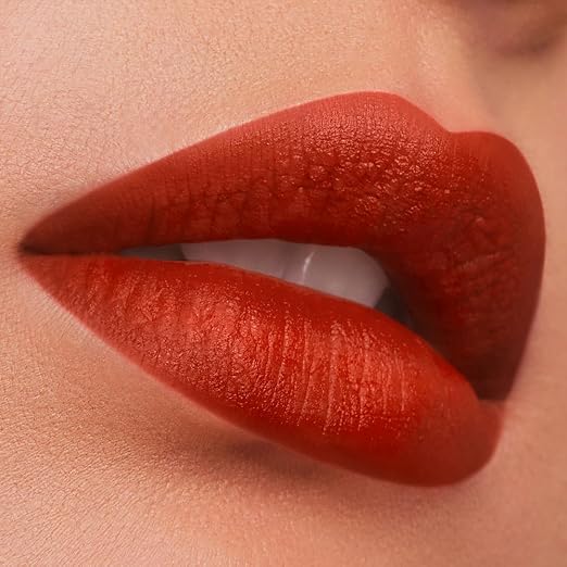 571 Independent - A burnt brick-orange with a warm undertone
