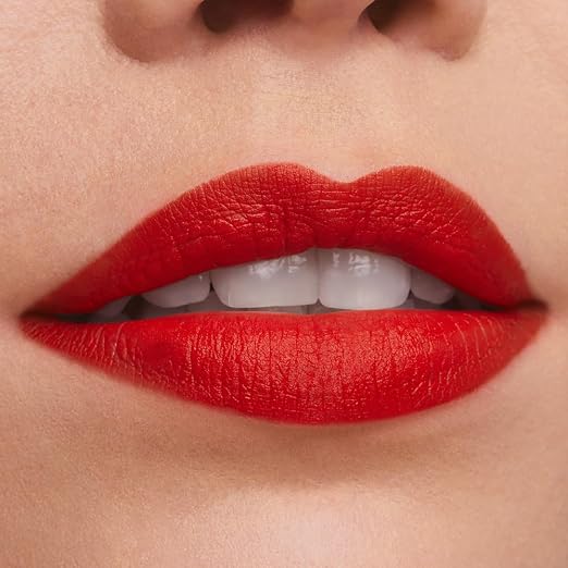 667 Deny All - A bright, orangey red with a warm undertone
