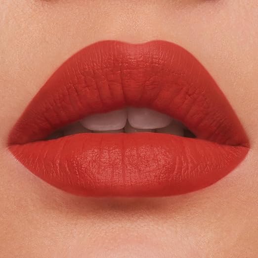 666 Captivated - A vibrant orange with a warm undertone