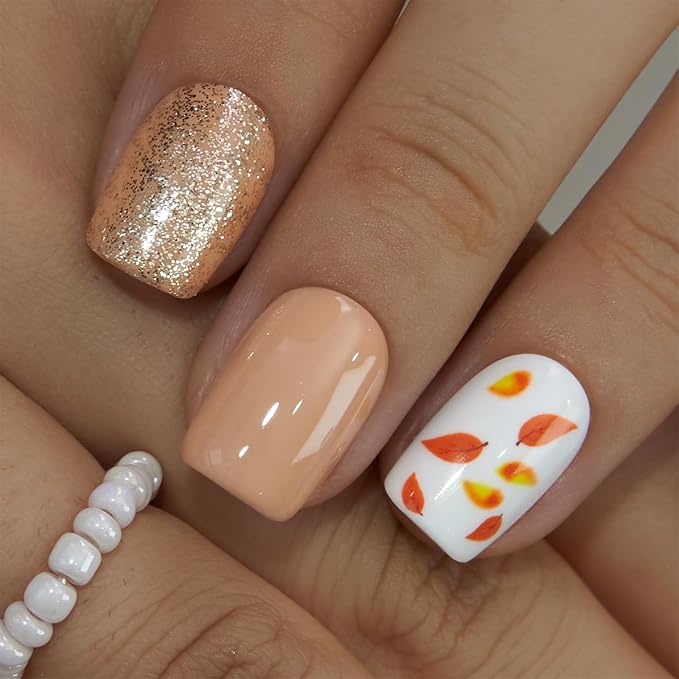 Autumn-Inspired Brown Nails with Glitter and Leaf Design